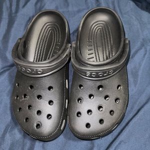 Black crocs. Kids or small adult size